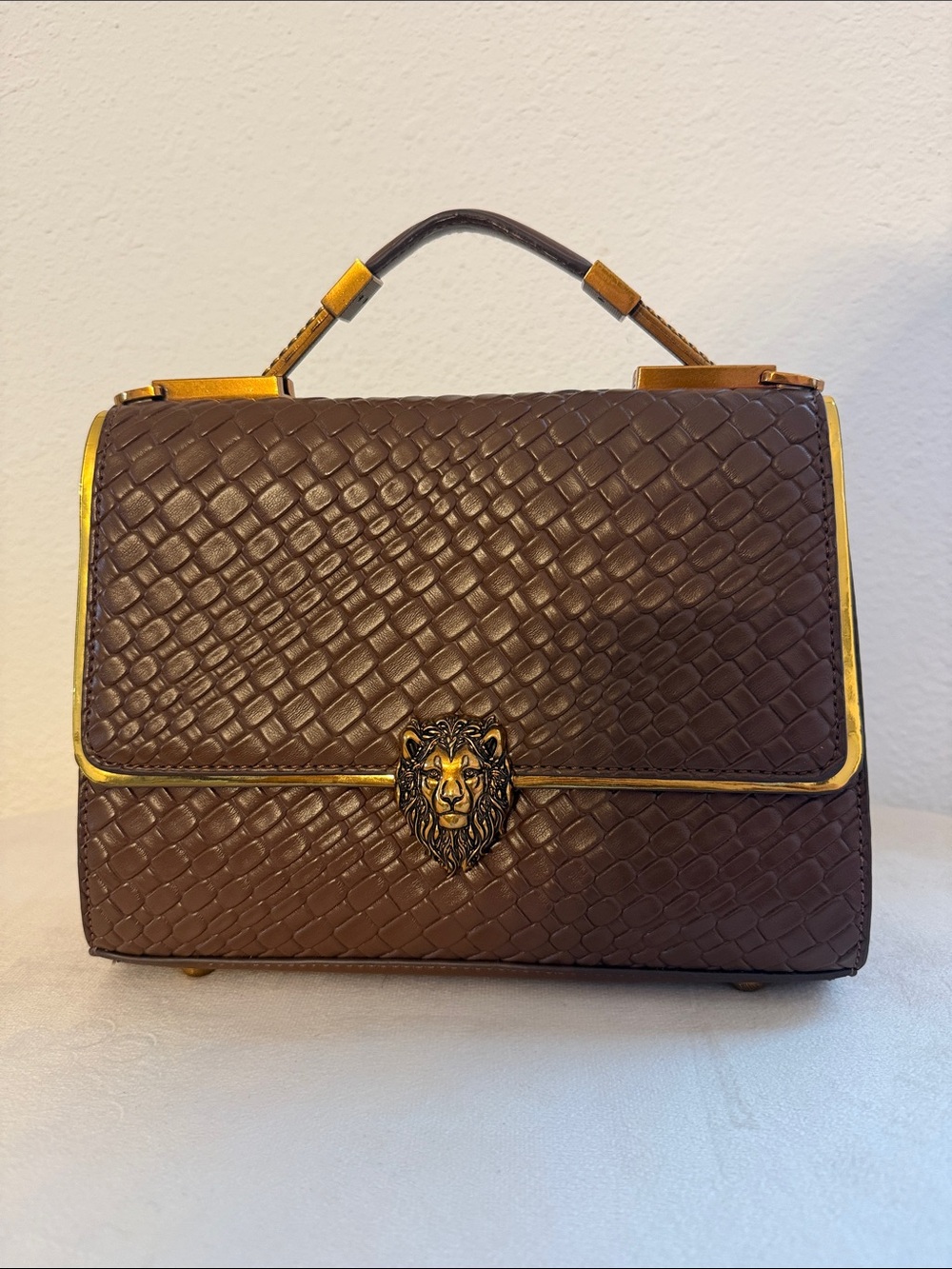 Brown Leather Top-Handle Bag with Lion Accent